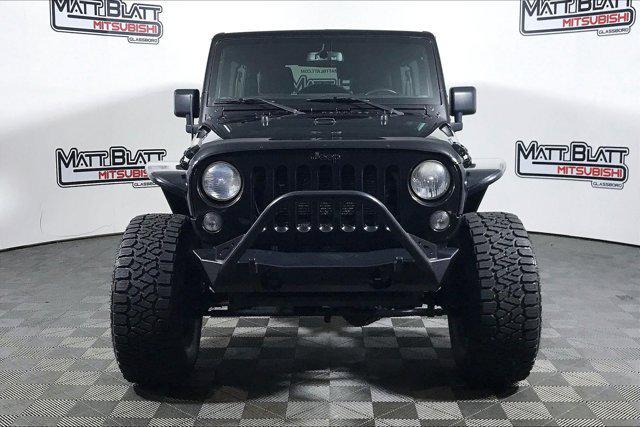 used 2015 Jeep Wrangler Unlimited car, priced at $21,999