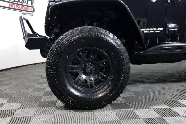 used 2015 Jeep Wrangler Unlimited car, priced at $21,999