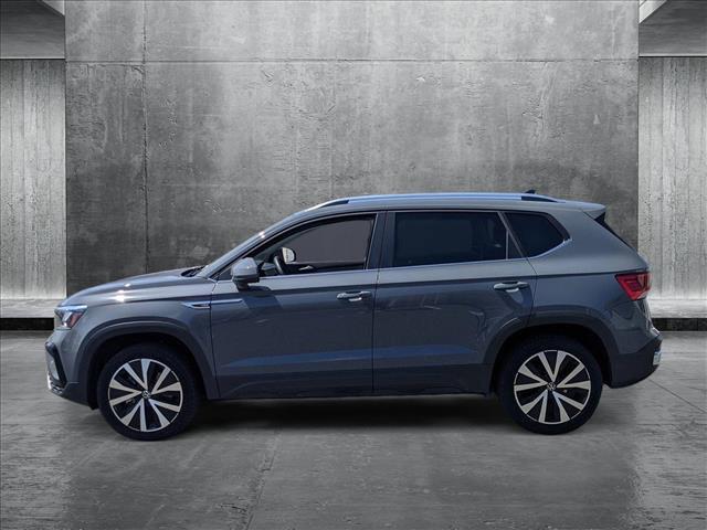 used 2023 Volkswagen Taos car, priced at $22,322