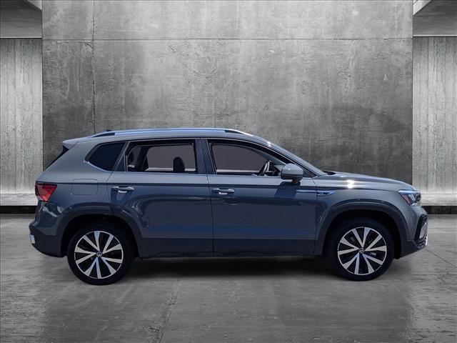 used 2023 Volkswagen Taos car, priced at $22,322