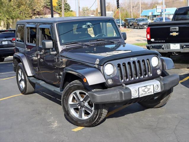 used 2014 Jeep Wrangler Unlimited car, priced at $17,495