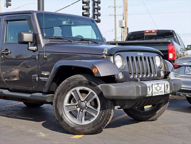 used 2014 Jeep Wrangler Unlimited car, priced at $17,495