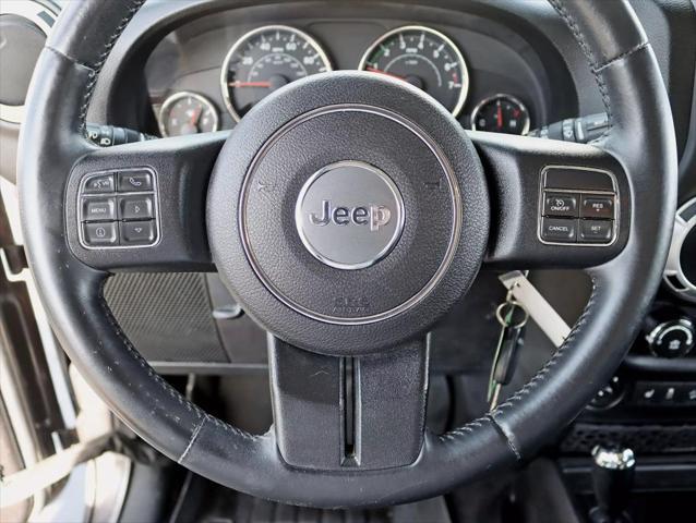 used 2014 Jeep Wrangler Unlimited car, priced at $17,495