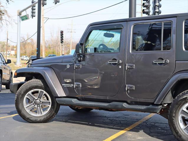 used 2014 Jeep Wrangler Unlimited car, priced at $17,495