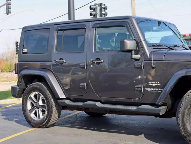 used 2014 Jeep Wrangler Unlimited car, priced at $17,495