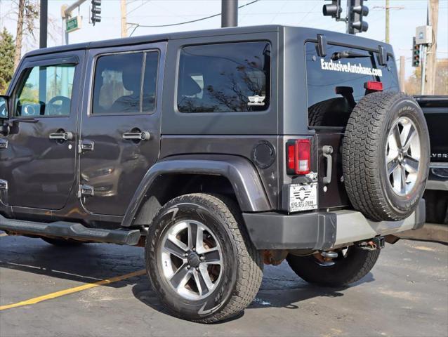 used 2014 Jeep Wrangler Unlimited car, priced at $17,495