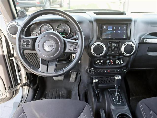 used 2014 Jeep Wrangler Unlimited car, priced at $17,495