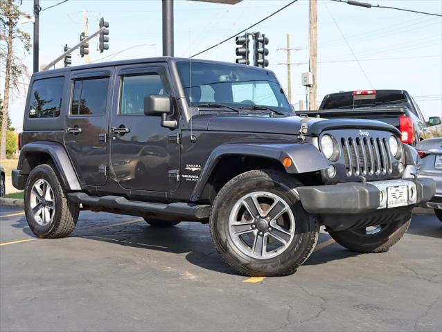 used 2014 Jeep Wrangler Unlimited car, priced at $17,495