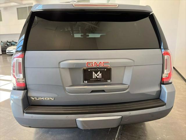 used 2015 GMC Yukon car, priced at $13,992