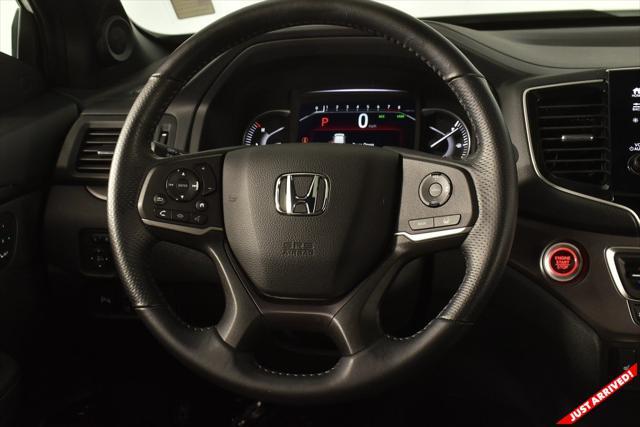 used 2023 Honda Passport car, priced at $36,000