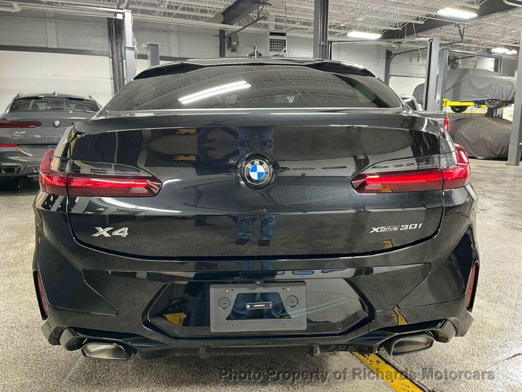 used 2025 BMW X4 car, priced at $50,890