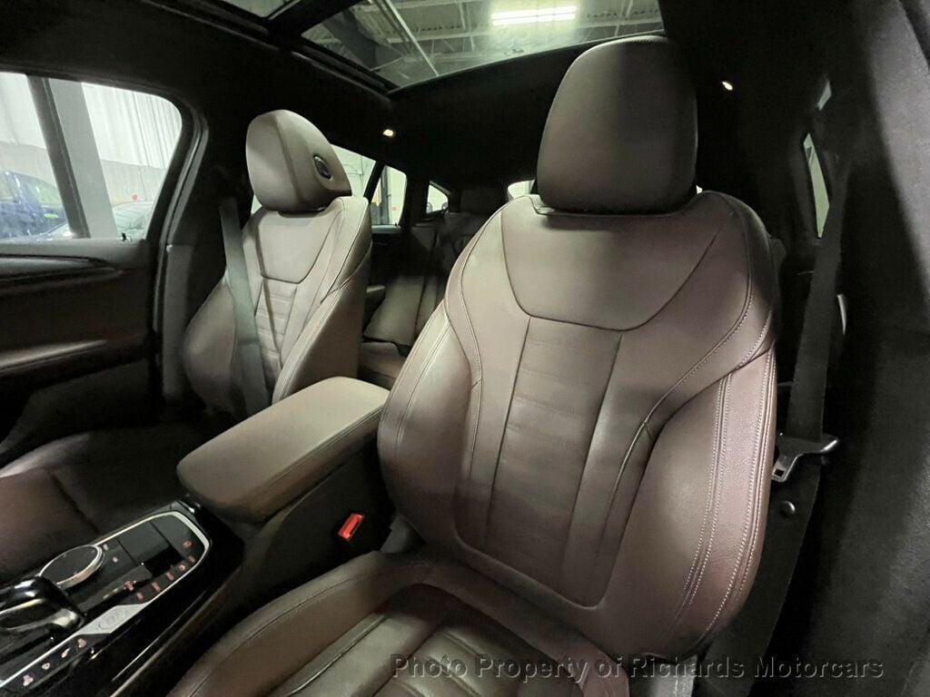 used 2025 BMW X4 car, priced at $50,890