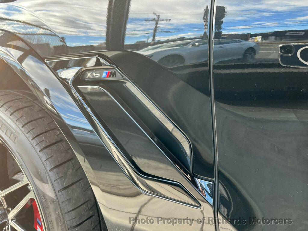 used 2022 BMW X6 M car, priced at $88,000