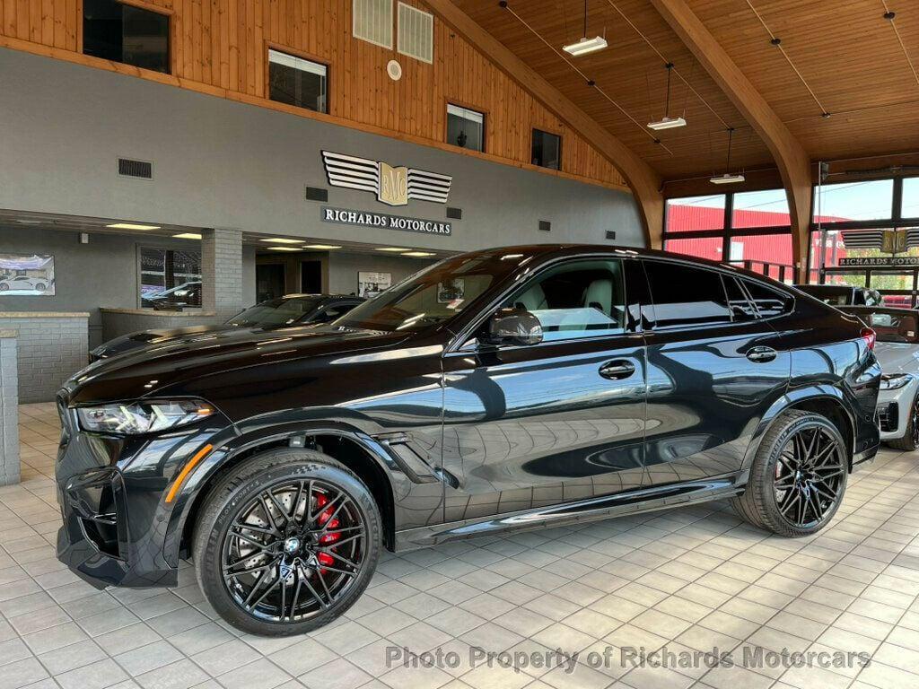 used 2025 BMW X6 M car, priced at $128,600