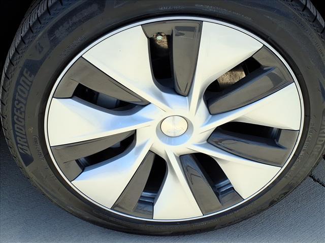 used 2023 Tesla Model Y car, priced at $31,372