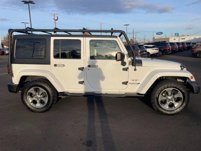 used 2018 Jeep Wrangler JK Unlimited car, priced at $23,354