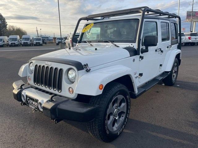 used 2018 Jeep Wrangler JK Unlimited car, priced at $23,354