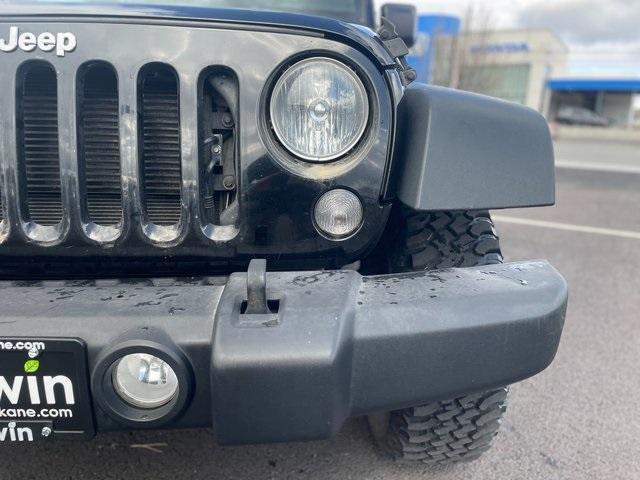 used 2015 Jeep Wrangler Unlimited car, priced at $17,911