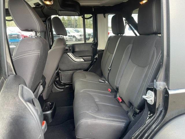 used 2015 Jeep Wrangler Unlimited car, priced at $17,911