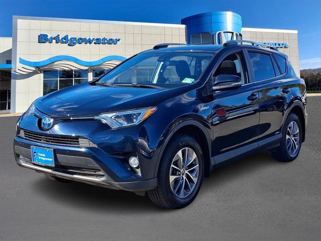 used 2018 Toyota RAV4 Hybrid car, priced at $23,300