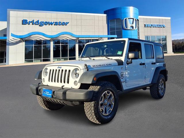 used 2014 Jeep Wrangler Unlimited car, priced at $16,995