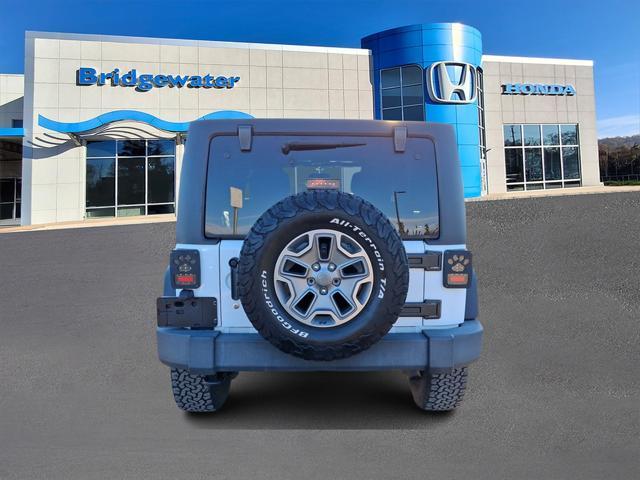 used 2014 Jeep Wrangler Unlimited car, priced at $17,995