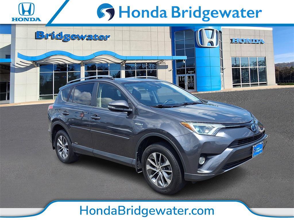used 2018 Toyota RAV4 Hybrid car, priced at $19,595