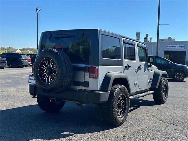 used 2018 Jeep Wrangler JK Unlimited car, priced at $19,355