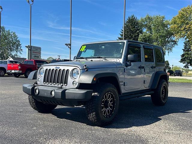 used 2018 Jeep Wrangler JK Unlimited car, priced at $19,355