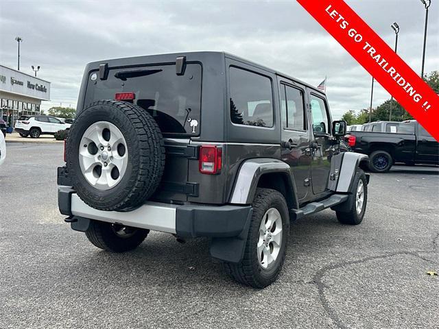 used 2014 Jeep Wrangler Unlimited car, priced at $15,895