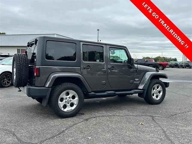 used 2014 Jeep Wrangler Unlimited car, priced at $15,895