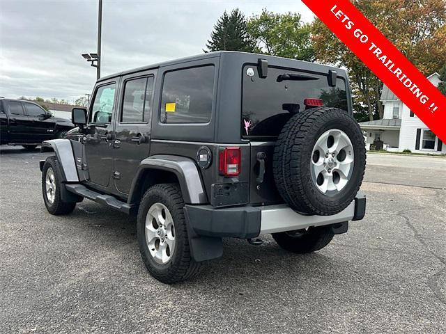 used 2014 Jeep Wrangler Unlimited car, priced at $15,895