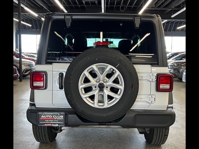 used 2023 Jeep Wrangler car, priced at $26,588