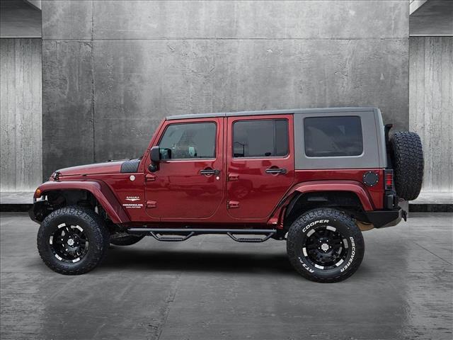 used 2010 Jeep Wrangler Unlimited car, priced at $14,991