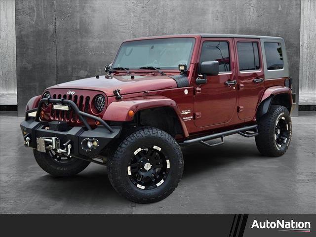 used 2010 Jeep Wrangler Unlimited car, priced at $13,991
