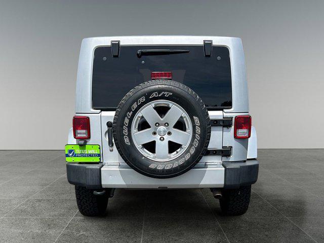 used 2011 Jeep Wrangler Unlimited car, priced at $15,977