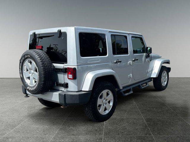 used 2011 Jeep Wrangler Unlimited car, priced at $15,977