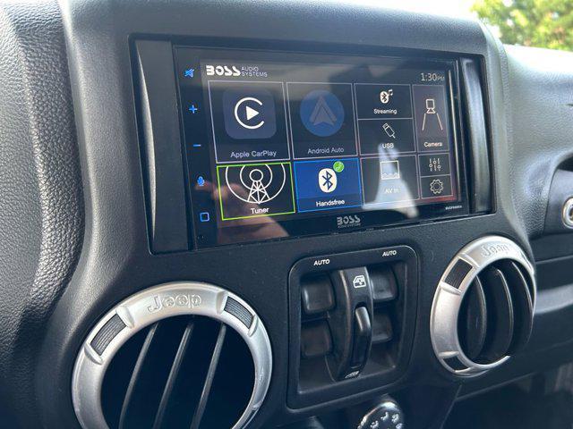 used 2011 Jeep Wrangler Unlimited car, priced at $15,977