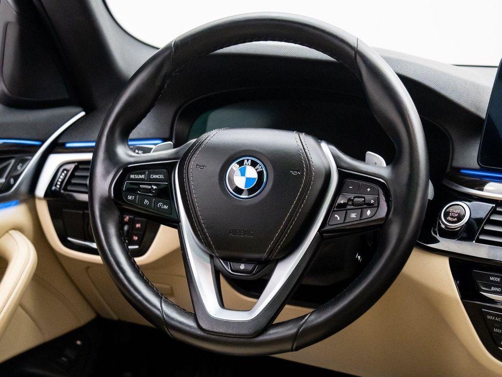 used 2023 BMW 530e car, priced at $38,000