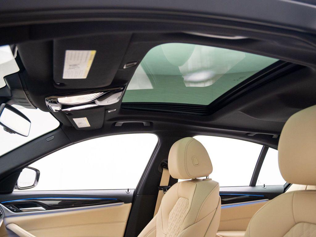 used 2023 BMW 530e car, priced at $38,000