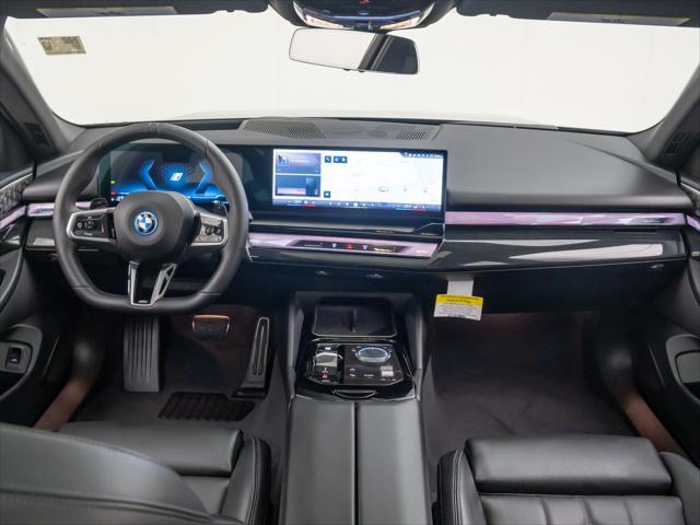 new 2026 BMW 550e car, priced at $84,335