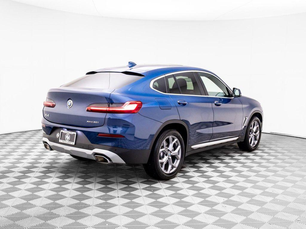 used 2024 BMW X4 car, priced at $54,900