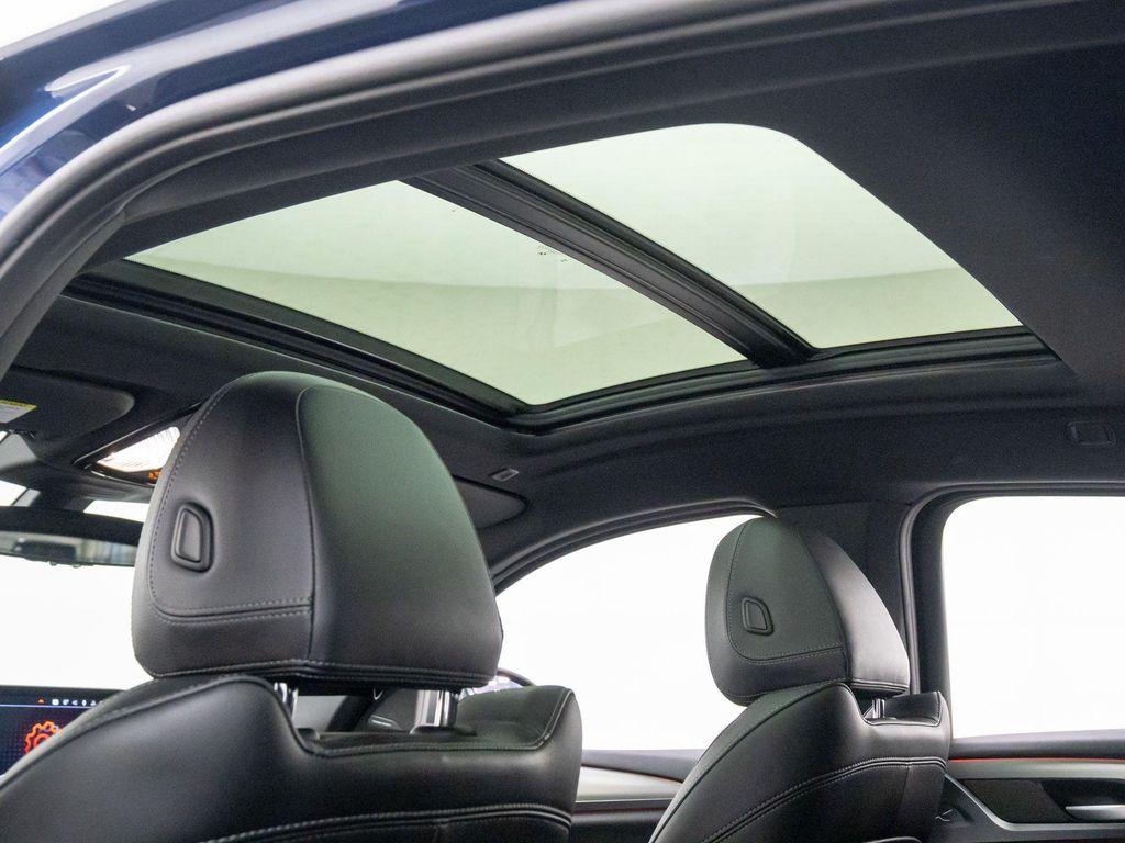 used 2024 BMW X4 car, priced at $54,900