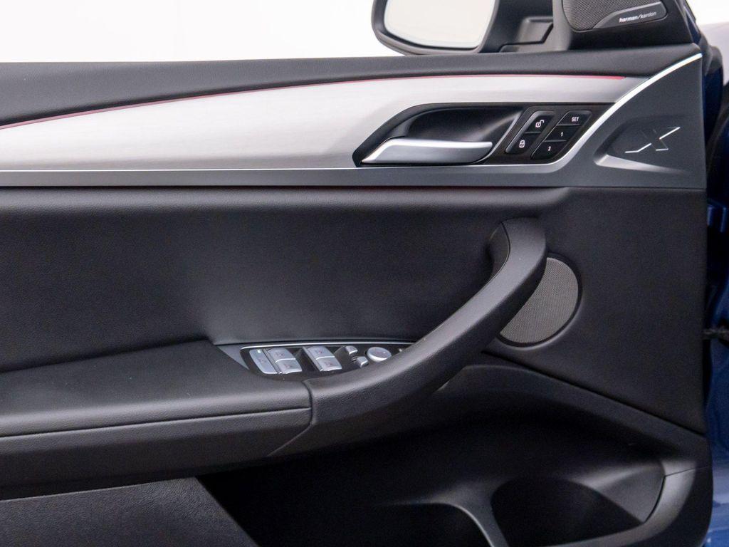 used 2024 BMW X4 car, priced at $54,900