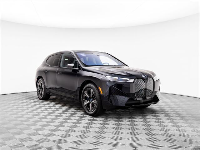 new 2024 BMW iX car, priced at $95,095