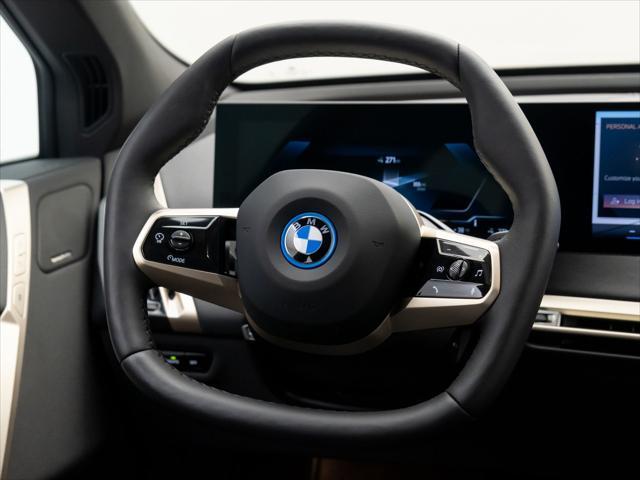 new 2024 BMW iX car, priced at $95,095