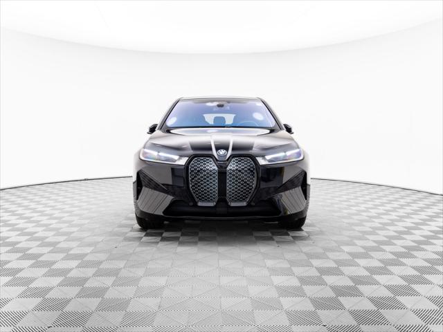 new 2024 BMW iX car, priced at $95,095