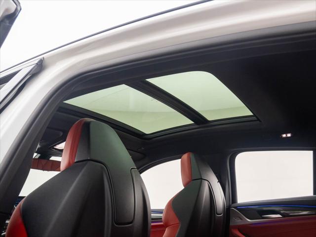 used 2024 BMW X4 M car, priced at $76,000