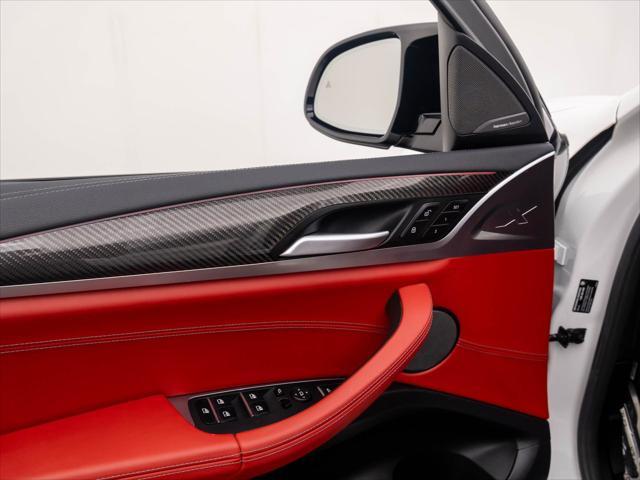 used 2024 BMW X4 M car, priced at $76,000