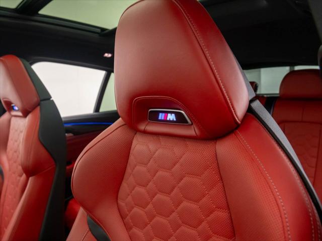 used 2024 BMW X4 M car, priced at $76,000